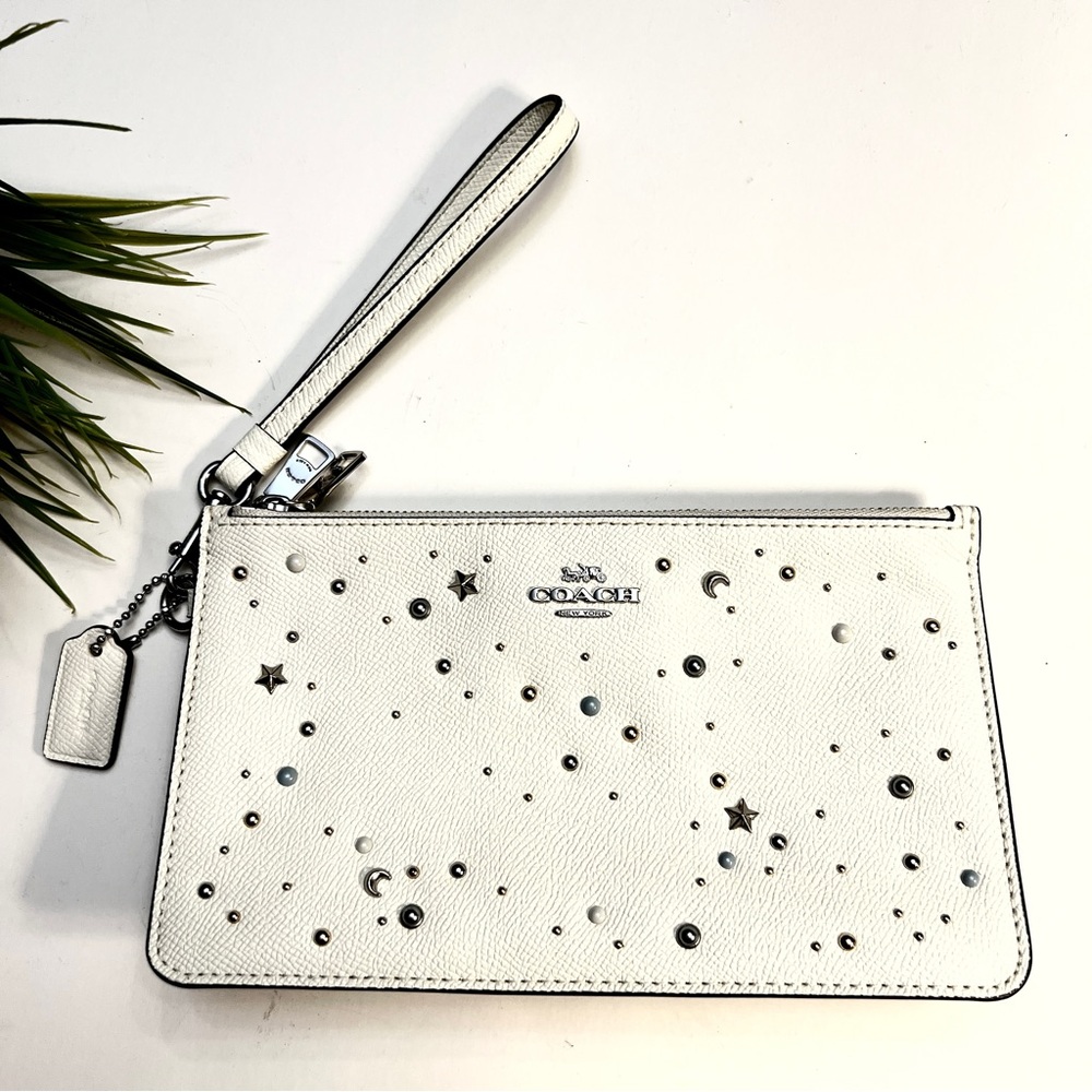 NWOT COACH CROSBY CLUTCH WITH
CELESTIAL STUDS